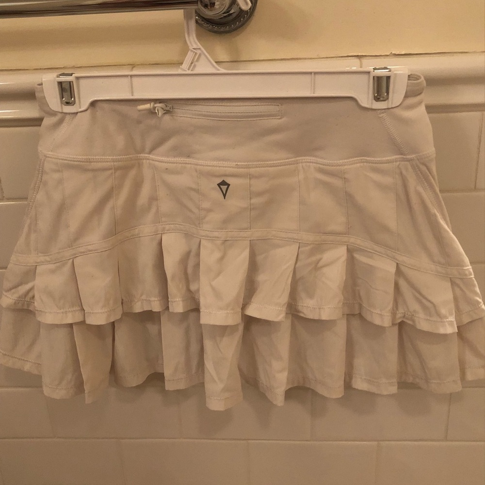 IVIVVA white “set the pace skirt”